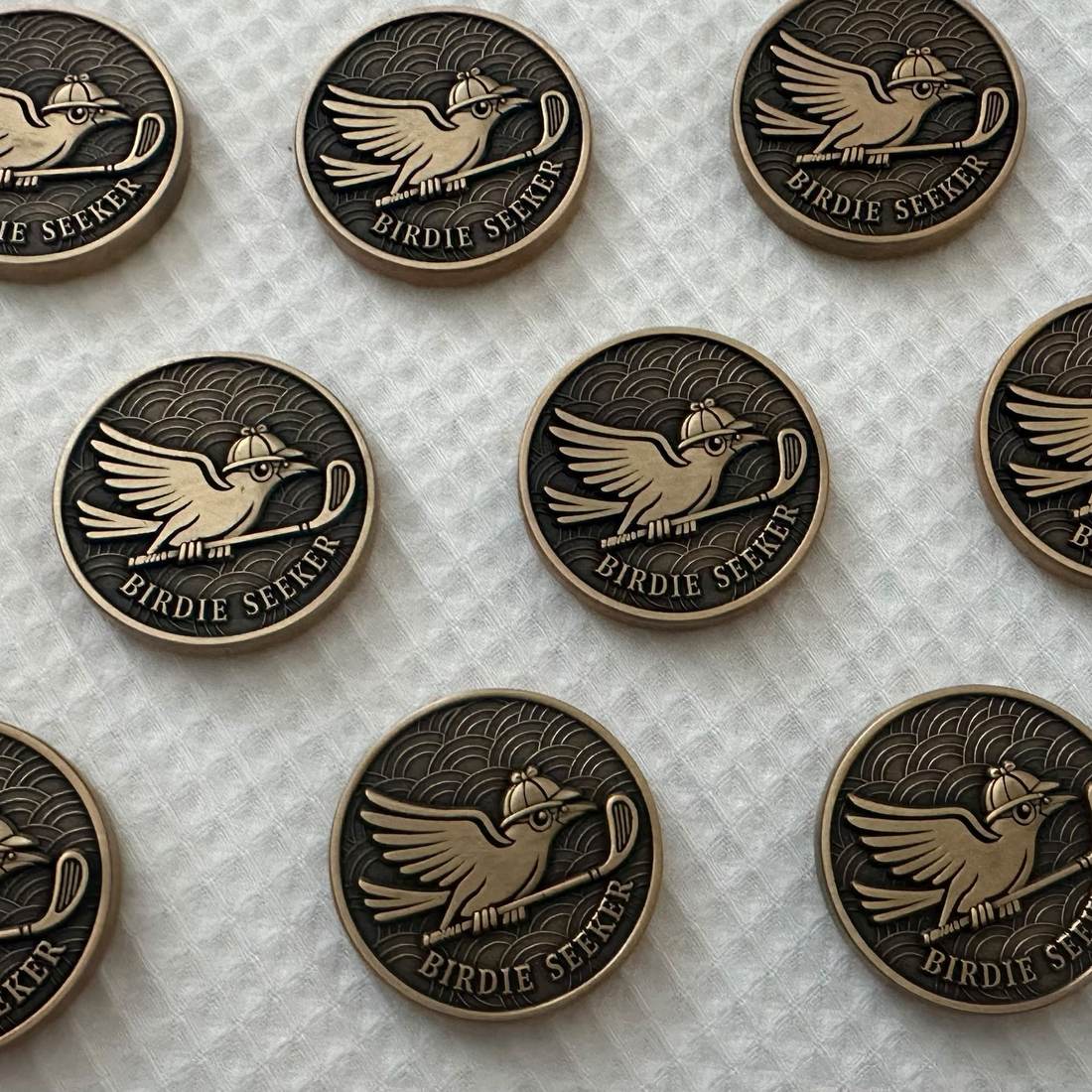 A batch of Birdie Seeker markers laid out after finishing